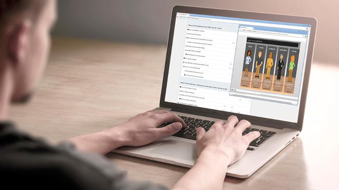 Man operating a laptop computer