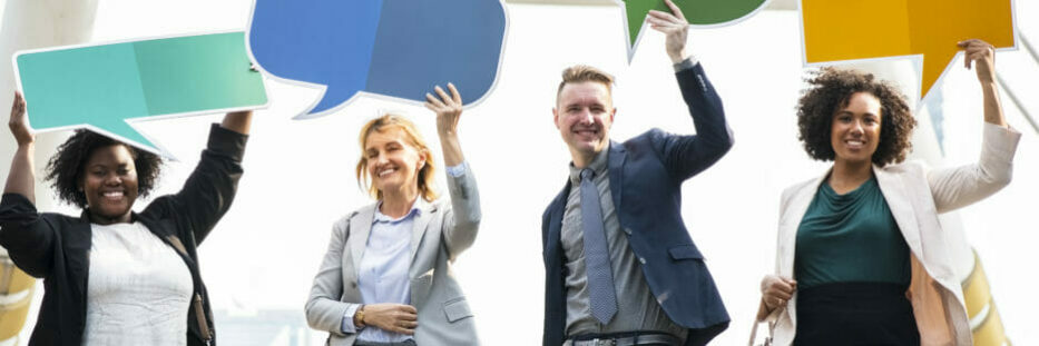 Successful business people with speech bubbles
