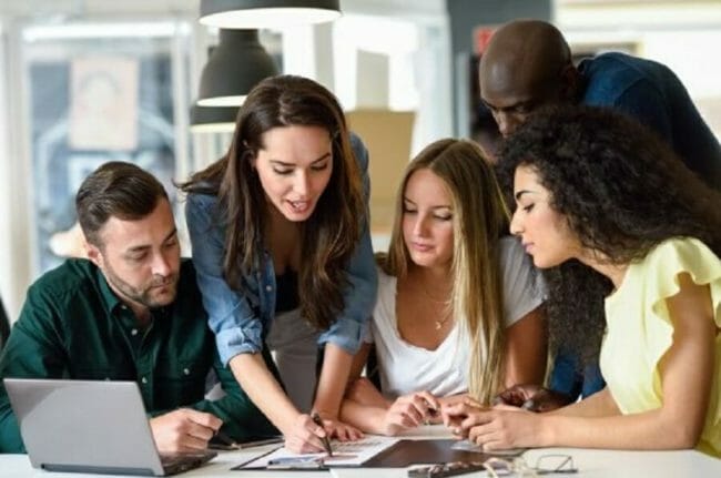 group of colleagues in a team meeting