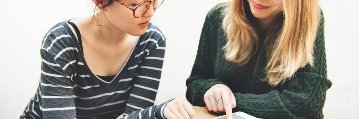 Women Friendship Digital Tablet News Networking Concept