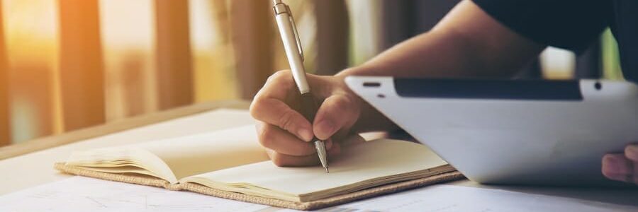 Business women signature at document