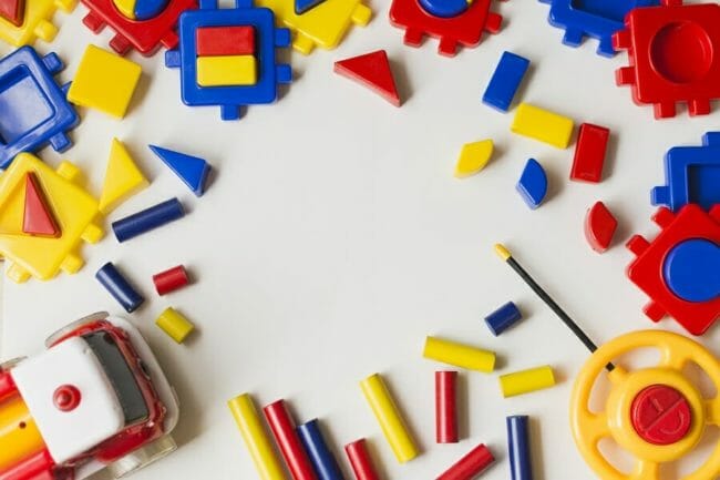 children's' puzzle pieces scattered on a flat surface