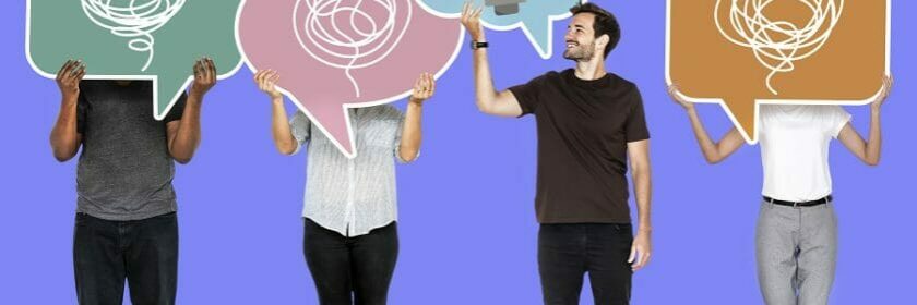 Creative man showing a light bulb symbol in a speech bubble