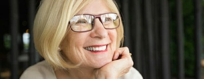 Closeup of Happy Attractive Senior Woman in Cafe Closeup of Happy Attractive Senior Woman in Cafe
