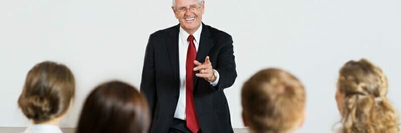 Senior Speaker Communicating with Audience Senior Speaker Communicating with Audience