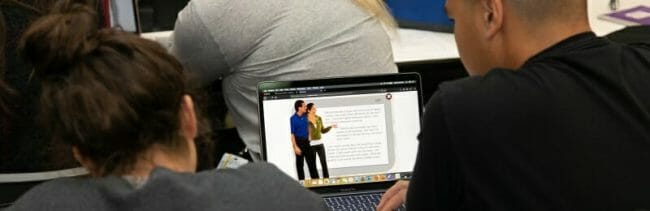 CETL patient case study-7b Students looking at case study on laptop