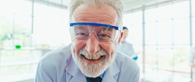 Portrait Science men working with chemicals in lab Portrait Science men working with chemicals in lab