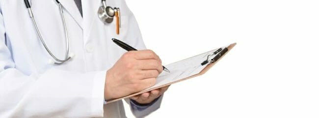 Medical doctor with copy space isolated on white background. Medical doctor with copy space isolated on white background.