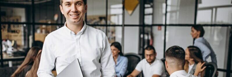 Group of people working out business plan in an office