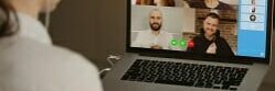 rearview-businesswoman-home-video-conference-with-her-colleagues-during-online-meeting-partners-video-call-multiethnic-business-team-having-discussion-online-meeting2